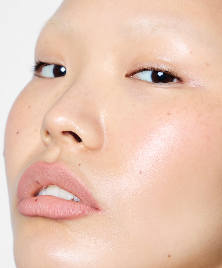 Model wears Lip Sculpt in Oat