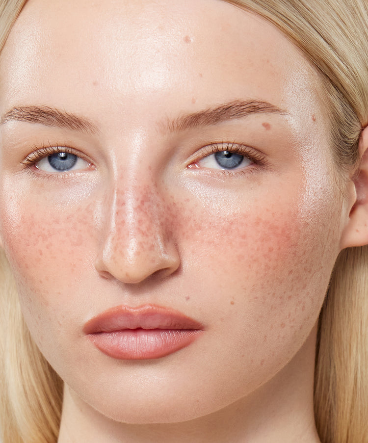 Model wears Lip Sculpt in Rosewood