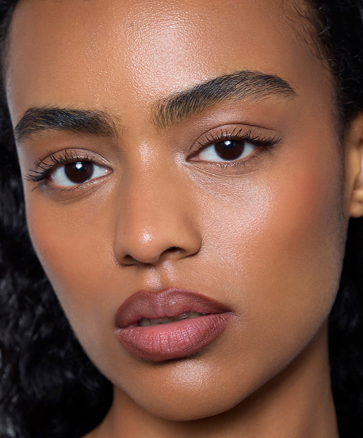 Manar wears Lip Sculpt in Suede