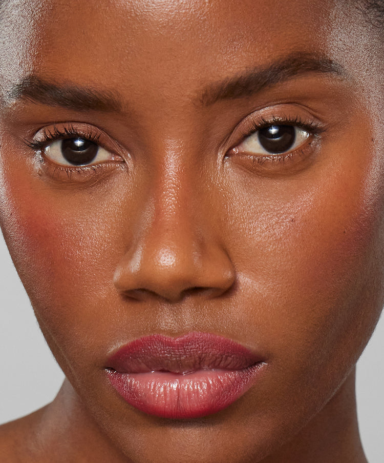Model wears Lip Sculpt in Red