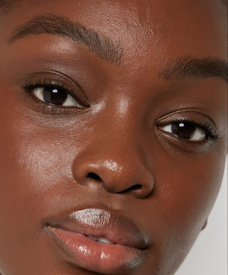 | desc: | text: light Model wears Brow Pencil in Black