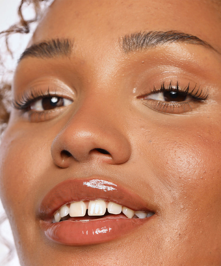 | desc: Francesca wears Lip Gloss in shade Fawn