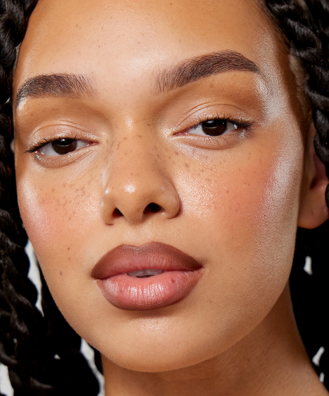 | desc: | text: light Gabbi wears Lip Sculpt in Suede